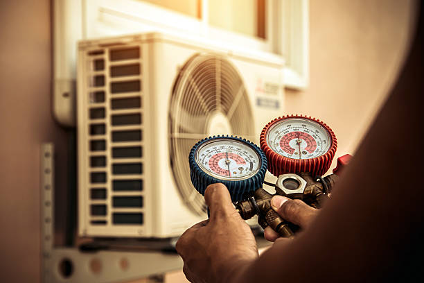 Professional Hvac technician working in Randallstown, MD